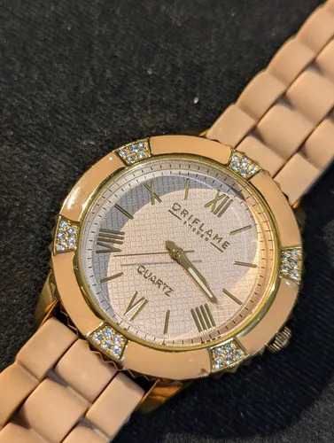 Reloj oriflame quartz precio best sale