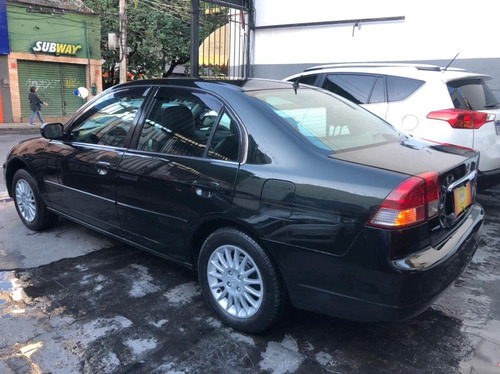 Imagem 6 de 12 de Honda Civic Lxl 1.7 Automático + Couro