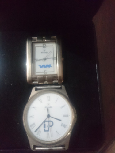 2 Relojes Marca Nivada Semi Nuevos.