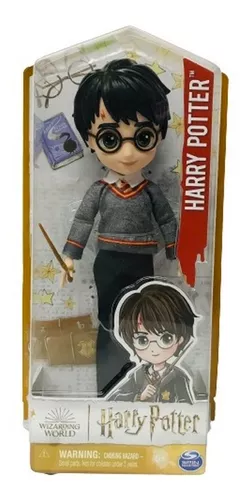 Harry Potter muñeco con varita y accesorios - Juguetes Vulcanita