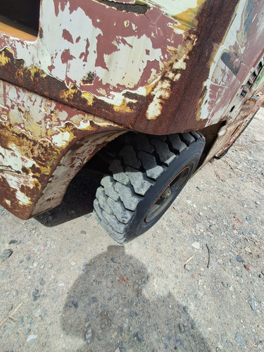 Autoelevador Tcm Cap.3000kg Con Clamps Para Bobinas