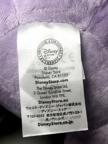 Imagem 5 de 5 de Boneco Pelúcia Stitch Baby Pijama Lilás E Xepa Scrum Disney