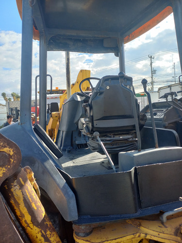 Retoexcavadora Jhon Deere