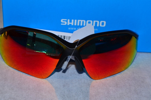 Imagem 1 de 8 de Oculos Shimano 1 Lente Transparente E 1 Fotocromatica