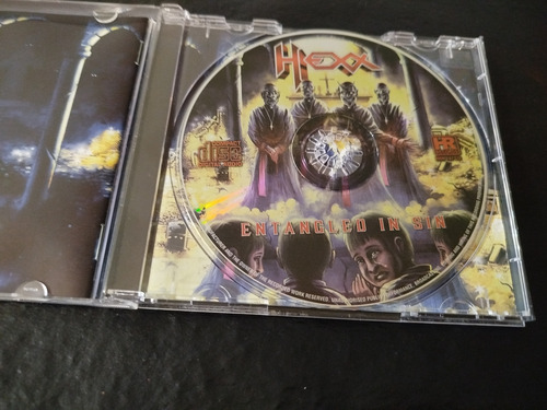 Hexx - Entangled In Sin (cd Alemania) Estándar (Usado)