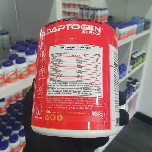 Suplemento en polvo con sabor a mango Intra Amino Sport de Adaptogen Science con sabor a mango, en tarro de 196 ml
