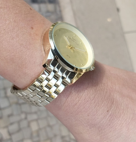 Relogio Technos Feminino Grande Dourado Folheado Moderno Aço