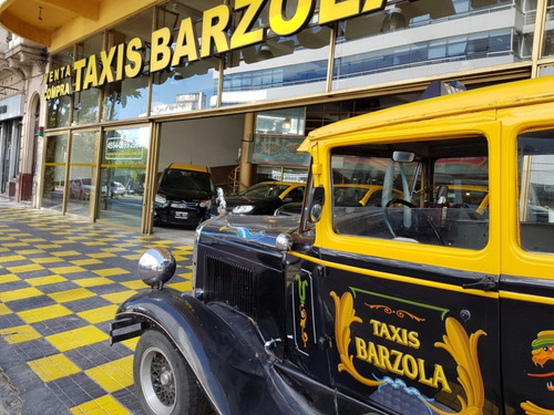 Imagen 3 de 9 de Taxi Spin Prisma Spin Voyage Siena Logan Voyage Licencia