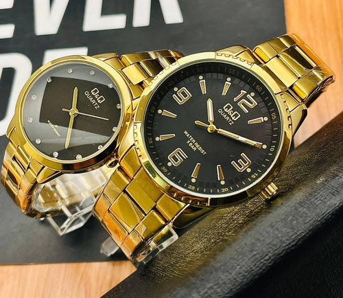 Pareja De Relojes Marca Qyq Originales Pulso Acero Analoga