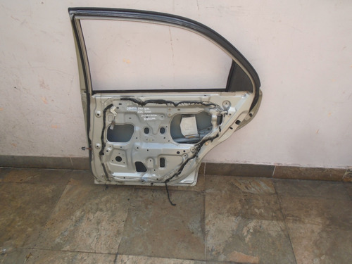 Vendo Puerta Trasera Derecha De Mazda Protege Año 2000