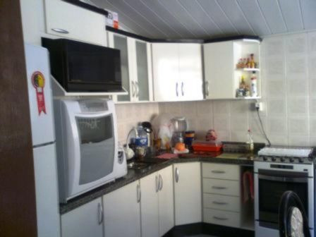 Casa Em Nonoai Com 4 Dormitórios - Mi12452