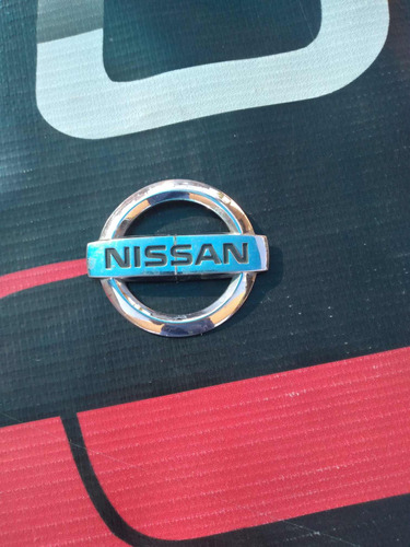 Emblema Nissan Platina  De Rin 04-05 Usada Original