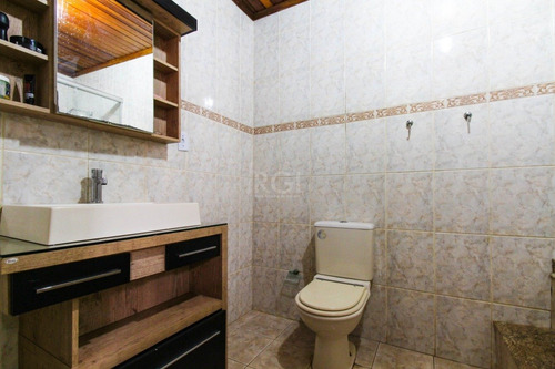 Casa Em Porto Alegre Com 3 Dormitórios - Ot7083