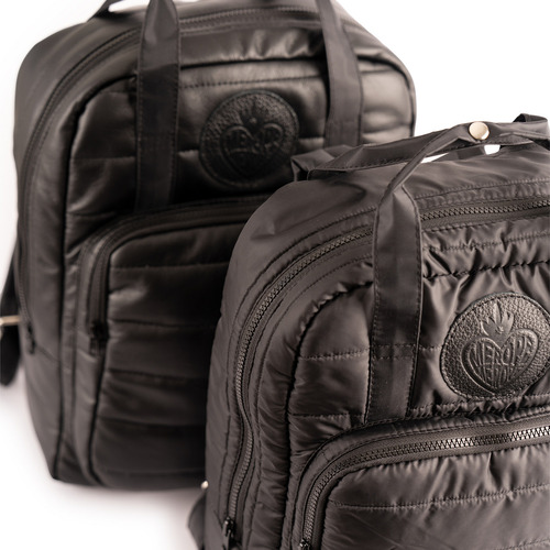 Mochila Olimpia Puffer Merope Color Negro engomado Diseño de la tela Rayas