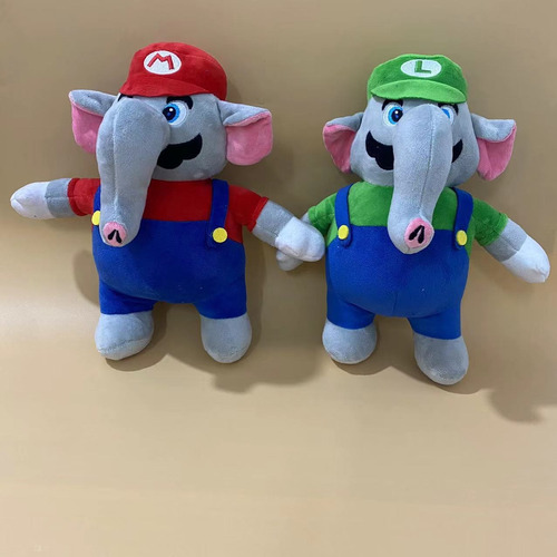 Muñecas De Peluche Alrededor Del Elefante