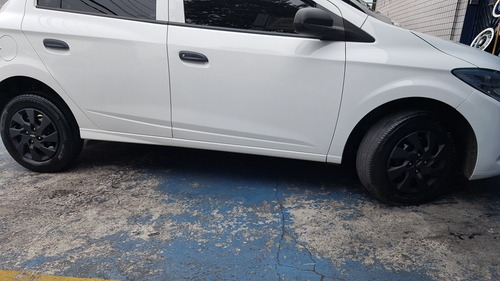 Imagem 7 de 7 de Jogo De Calotas Esportiva Preta Fosco 4 Peças Onix Corsa Celta Prisma Aro 14 G133pfj