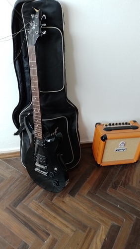 Guitarra Cort Más Amplificador Orange