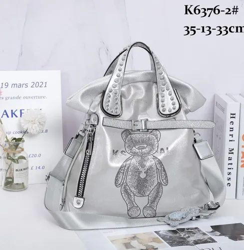 Cartera Marca Kaishilan Color Plateado Con Tachas Cuotas sin inter s