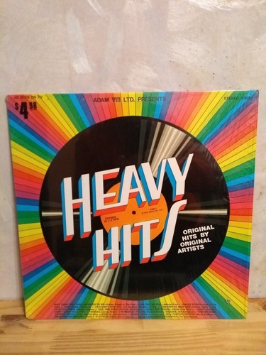 Vinilo Compilado Heavy Hits ( Barry White, The Who ) .