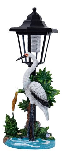 Escultura De Resina De Figuras De Grúa Con Linterna Solar