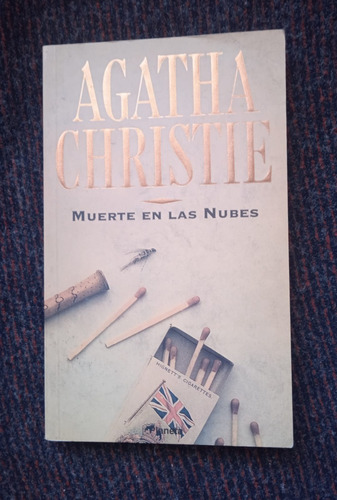 Muerte En Las Nubes De Agatha Christie