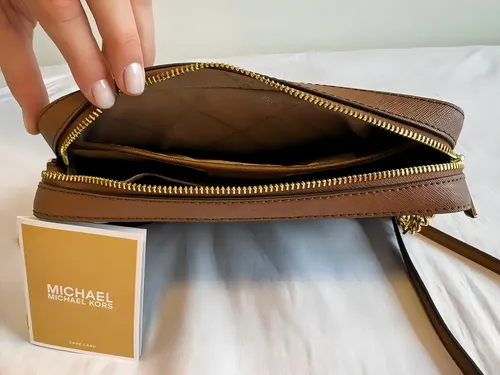 Bolsa Michael Kors Jet Set Travel Marrom | Parcelamento sem juros