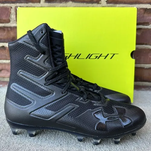 Green and black under armour football cleats 2025