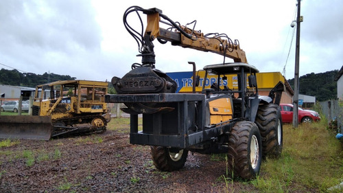 Munck Hegeza E Trator Valtra Bm110