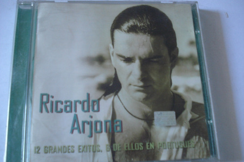 Cd Ricardo Arjona 12 Grandes Exitos 6 En Portugues