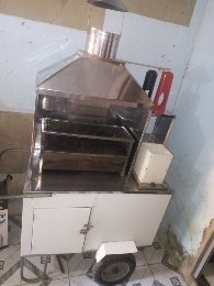 Imagem 1 de 5 de Carrinho De Churrasco E Isopor