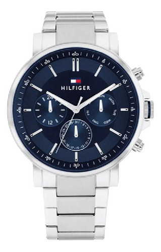 Reloj pulsera Tommy Hilfiger 1710588 con correa de acero color plateado - fondo azul
