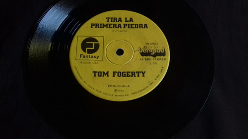 Single Tom Fogerty Tira La Primera Piedra