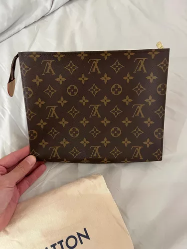 Louis VUITTON, BOLSA DE MANO EN TELA REVESTIDA DE MONOGR…