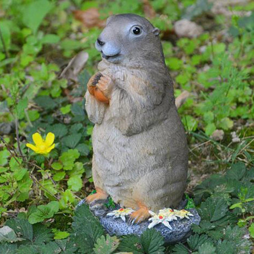Apoyos De La Foto De La Escultura Del Jardín De La Marmota