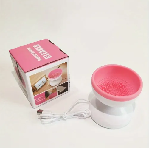 Máquina limpiadora de brochas de maquillaje eléctrica rotativa de color blanco con color rosa
