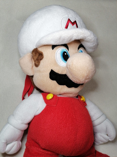 Imagen 4 de 9 de Peluche Mochila Original Mario Fire All Starl Nintendo 50cm.