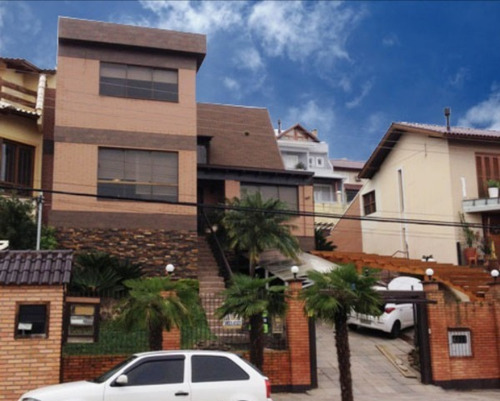 Casa Em Ipanema Com 4 Dormitórios - Mi5493