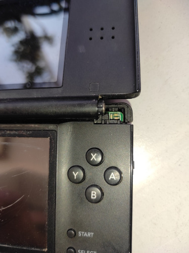 Nintendo 3ds Lite Para Reparar O Repuesto Cargador Y Forro (Usado)