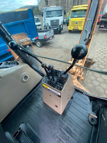 Imagem 24 de 25 de Retro Escavadeira Case 4x4 580n Cabinada Com Ar Condicionado