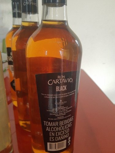 Imagen 1 de 3 de 5 Botellas De Ron Cartavio Y 2 De Hanna Club
