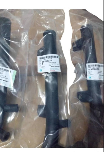 Tubo De Agua Plastico Trasero Chevrolet Aveo