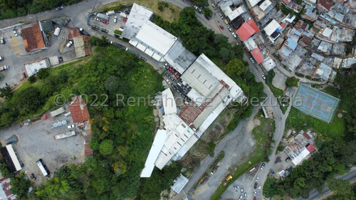 Extenso Terreno Con 3 Galpones En  Venta La Trinidad Caracas 23-22097