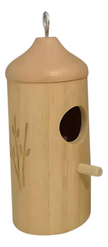 Un Comedero Decorativo Para Pájaros Con Forma De Casa De Col