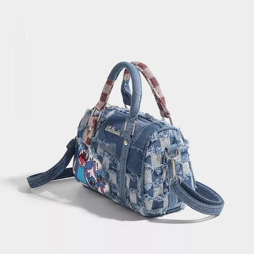 - Para A Bolso De Mezclilla Stitch Con Costuras Rasgadas /