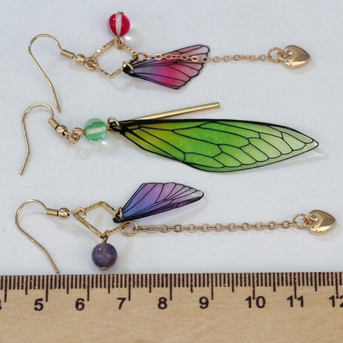 Imagen 3 de 3 de Aros Desiguales En Mariposa