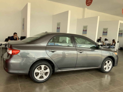 Imagen 4 de 14 de Toyota Corolla 2011 4p Xle Aut W/moonroof A/a Ee Cd R-16 Ab