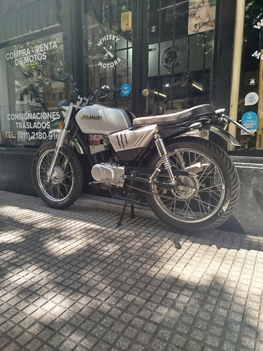 Suzuki Ax 100