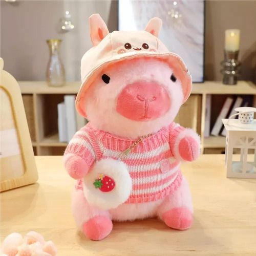 Peluche Capibara Con 10 Piezas De Ropa Y Accesorios