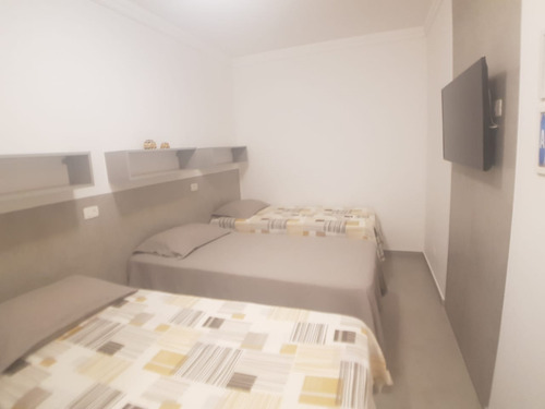 Imagem 3 de 10 de Apartamento Reformado A Venda Praia Do Tombo - 1 Sala Para Dois Ambientes, 1 Dormitório, 2 Banheiro, Cozinha, Área De Serviço. - Ap05038 - 67650891