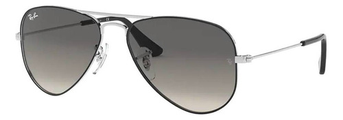 Óculos de sol Ray-Ban Aviador Junior 8-12 anos armação de metal cor polished black, lente grey de plástico degradada, haste polished black de metal - RJ9506S